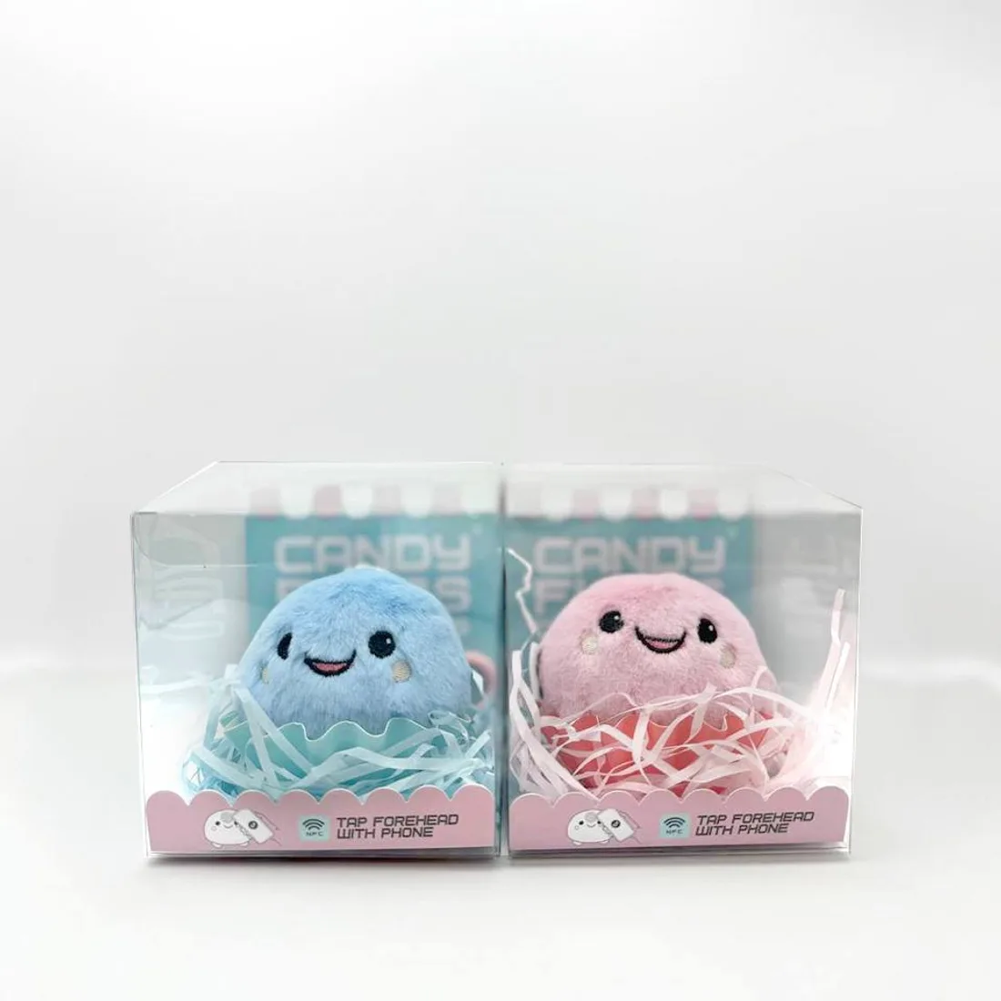 Winky and Pinky in their gift boxes, side by side